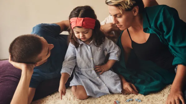 Family doing a puzzle together