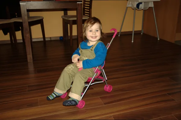 Child sitting in a stroller