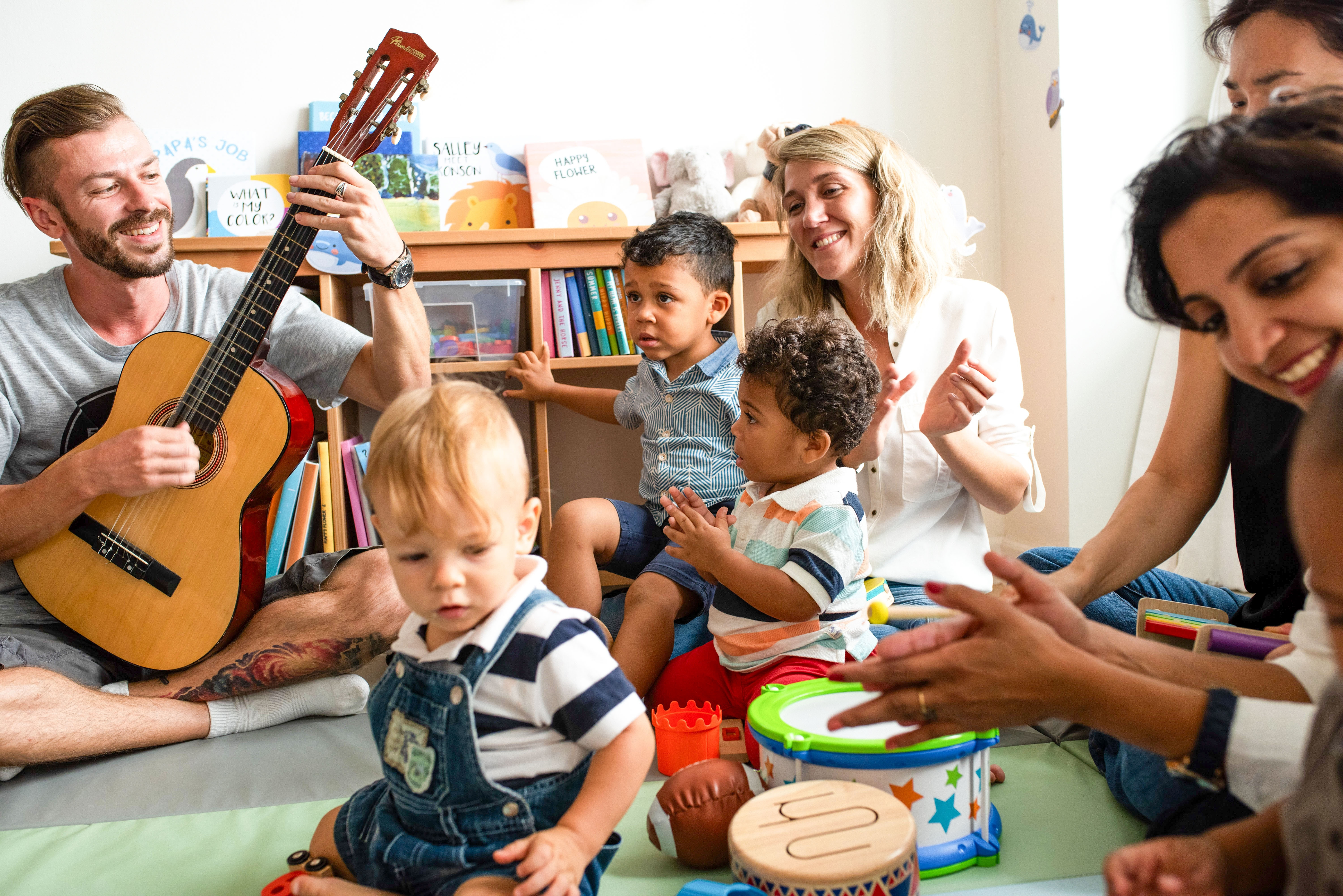 families playing music at school