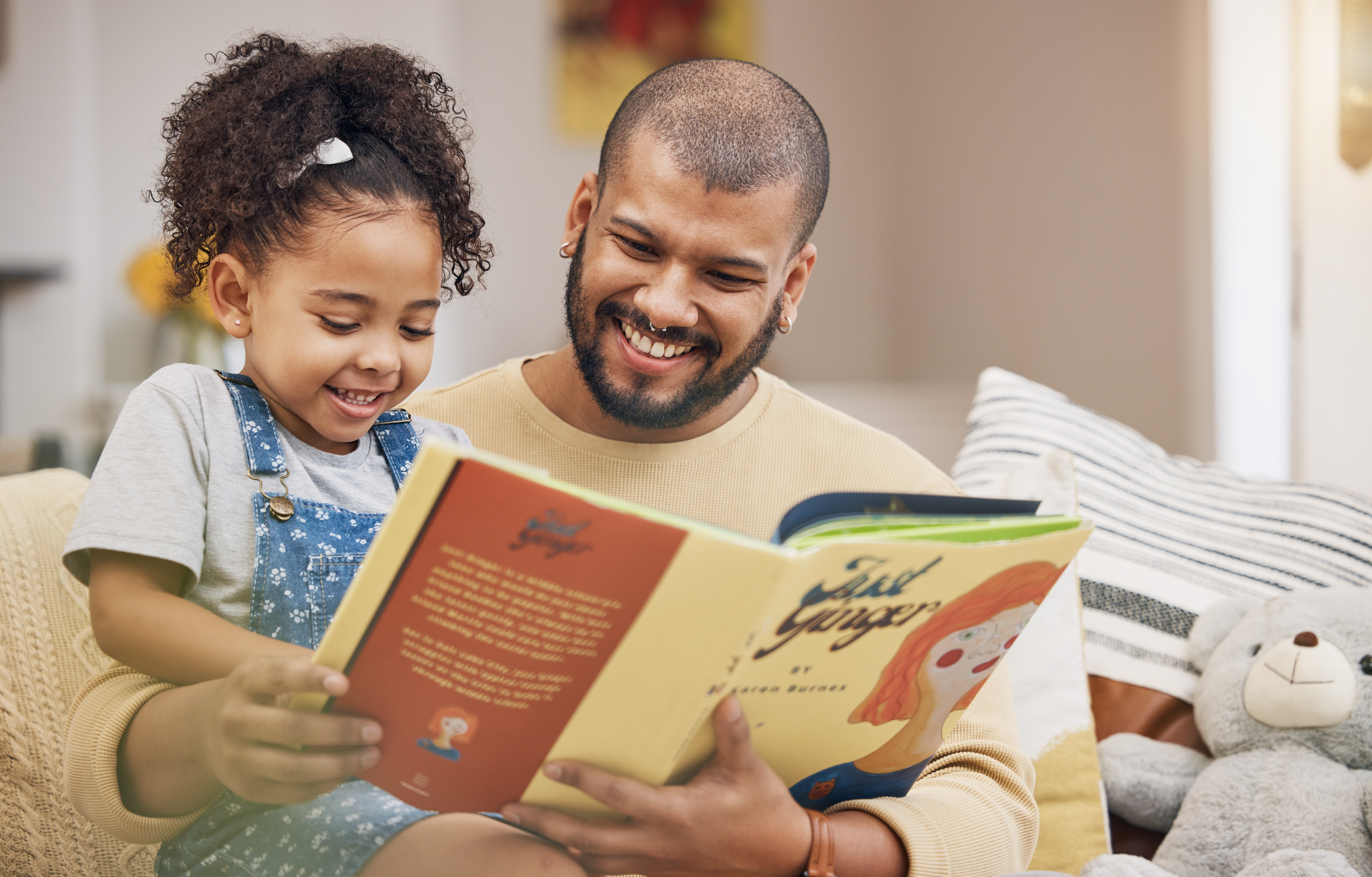 dad reading to daughter