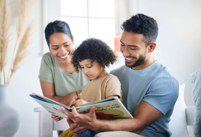 family reading a book