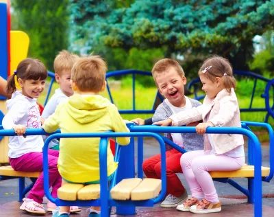 children outside on playground at daycare