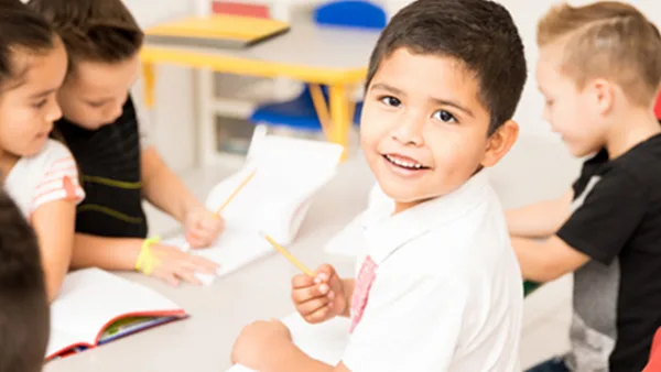 Children practicing writing skills